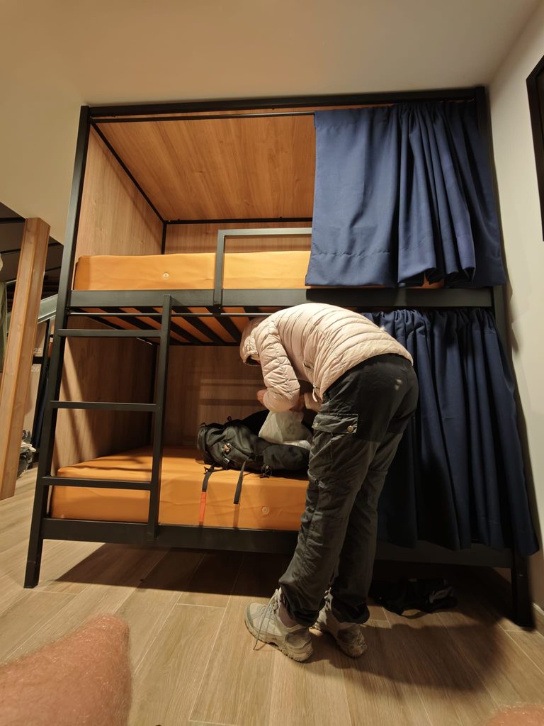 Bunk beds with curtains in the renovated Refugio de Altavista on Teide