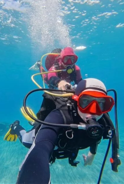 Diver over the reef